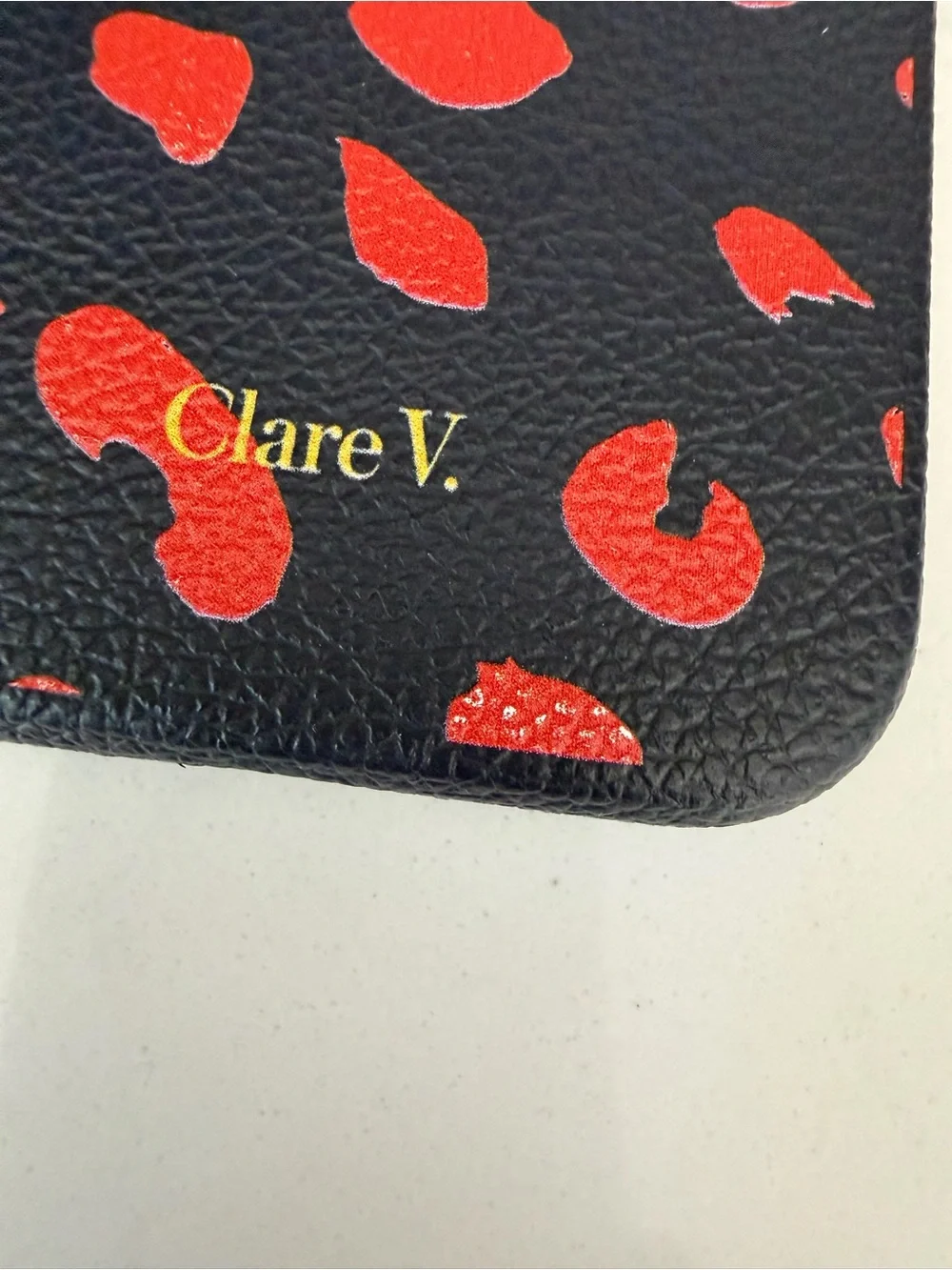 Clare V. x Casetify Navy with Poppy Jaguar Print Leather iPhone 15 Pro Case